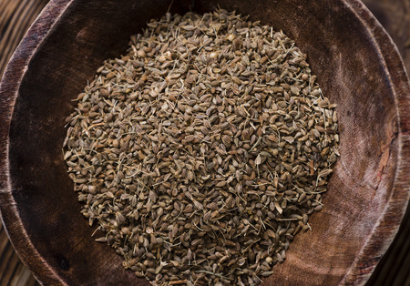 Anise Seeds (selective focus) on vintage wooden backgroundの写真素材