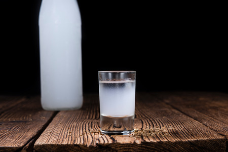 Frozen Ouzo (Greek aperitif) on vintage wooden backgroundの写真素材