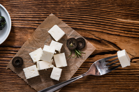 Fresh Feta Cheese (detailed close-up shot) on vintage backgroundの写真素材