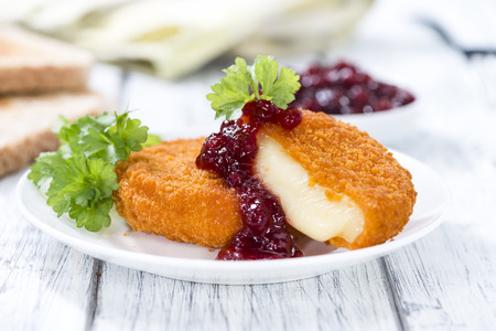 Fried Camembert (selective focus) with Cranberry sauceの写真素材