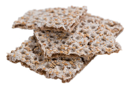 Some Crispbread isolated on white background (close-up shot; selective focus)