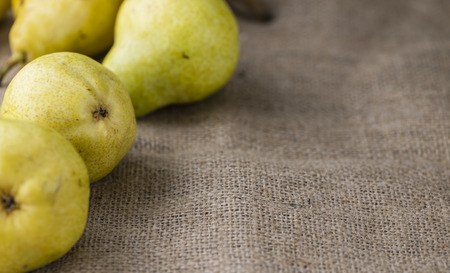 Some fresh Pears (selective focus) on wooden backgroundの写真素材