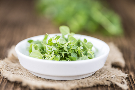 Oregano (detailed close-up shot; selective focus) on vintage wooden backgroundの写真素材