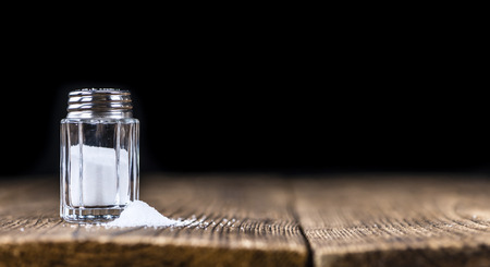Salt Shaker (selective focus; close-up shot) on vintage backgroundの写真素材