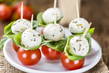Fresh made Tomato Mozzarella Salad with Basil (selective focus)の写真素材