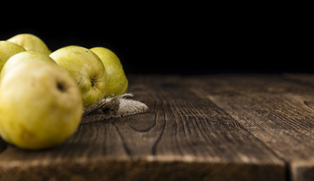 Some fresh Pears (selective focus) on wooden backgroundの写真素材