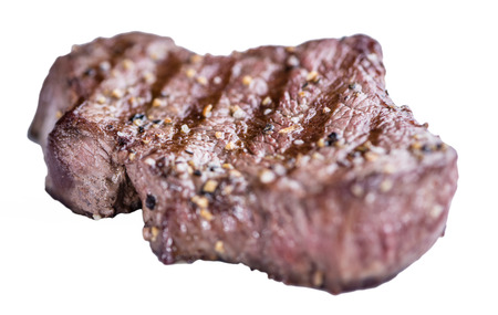Grilled Beef (selective focus) isolated on white backgroundの写真素材