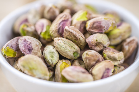 Pistachio Kernels as detailed close-up shot (selective focus)