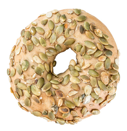 Wholemeal Bagels (selective focus; detailed close-up shot) isolated on white backgroundの写真素材