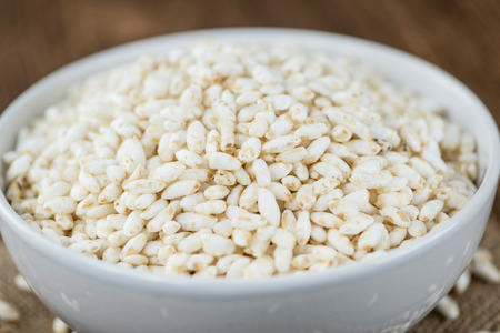 Old wooden table with puffed Rice (detailed close-up shot)の写真素材
