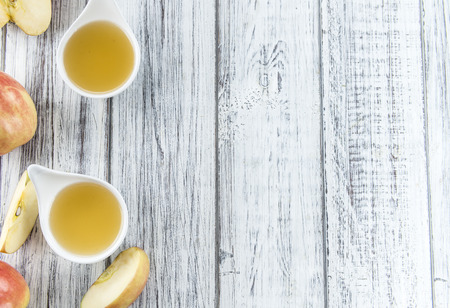 Portion of fresh made Applesauce (close-up shot) on vintage backgroundの写真素材