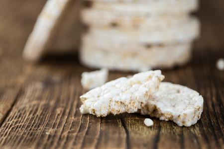 Old wooden table with Rice Cakes (detailed close-up shot)の写真素材