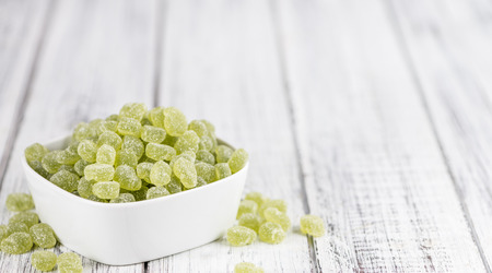 Apple flavoured gummy candy (close-up shot; selective focus)の写真素材