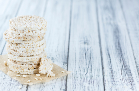 Some Rice Cakes on an old wooden background (detailed close-up shot)の写真素材