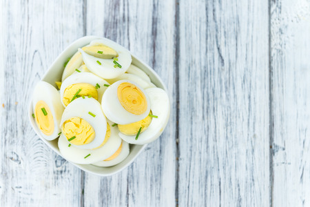 Portion of halved Eggs as detailed close-up shot (selective focus)の写真素材