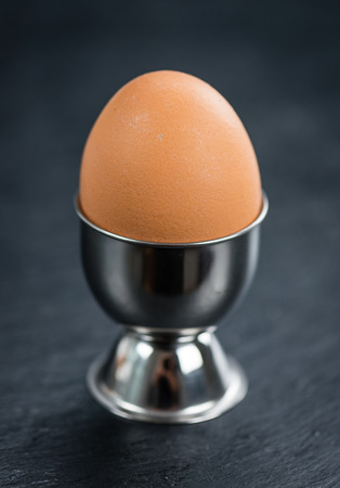 Slate slab with boiled Eggs (selective focus; close-up shot)の写真素材