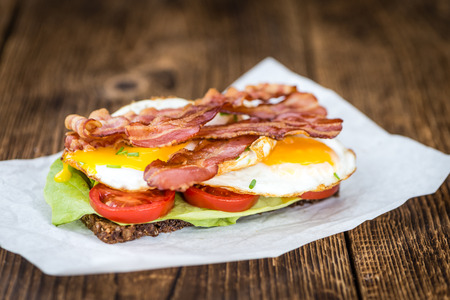 Fresh made Bacon and Egg Sandwich (selective focus; close-up shot)の写真素材