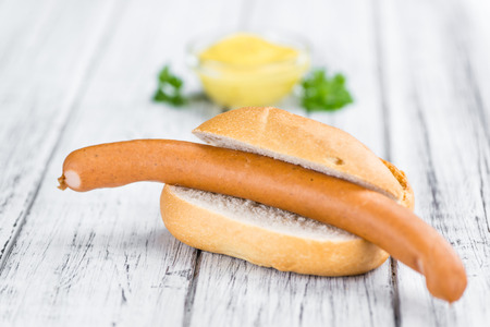 Fresh made German Sausages (Wiener) on a vintage background (close-up shot)の写真素材