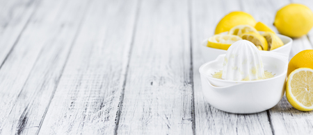 Fresh made Juice (lemon) on a vintage background (close-up shot)の写真素材