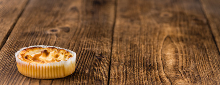 Homemade Cheesecake on vintage background (selective focus; close-up shot)の写真素材