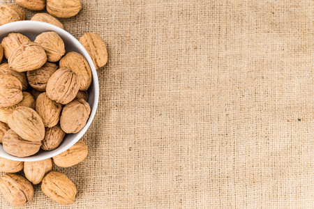 Portion of fresh Walnuts (close-up shot; selective focus)の写真素材