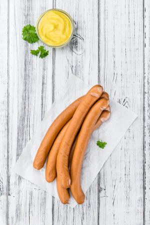 Wiener Sausages on a vintage background as detailed close-up shot (selective focus)の写真素材