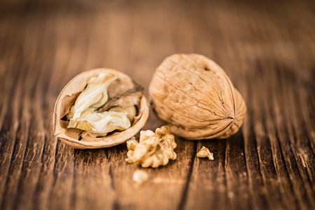 Portion of fresh Walnuts (close-up shot; selective focus)