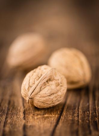 Portion of fresh Walnuts (close-up shot; selective focus)の写真素材