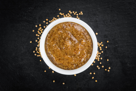 Sweet Mustard on a vintage background as detailed close-up shot (selective focus)の写真素材