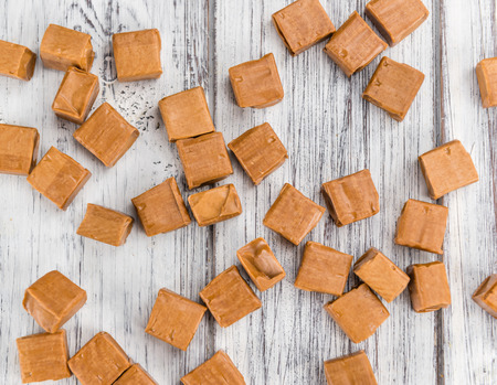 Caramel on a vintage background as detailed close-up shot (selective focus)の写真素材