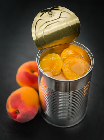 Pickled Apricots on a vintage background as detailed close-up shot (selective focus)の写真素材