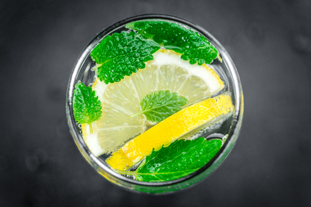 Lemonade on a vintage background as detailed close-up shot (selective focus)の写真素材