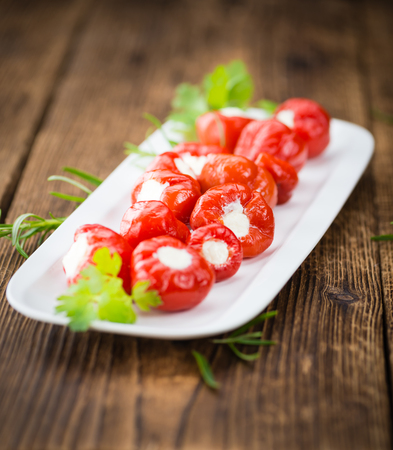 Some homemade Red Pepper (stuffed with cheese) (selective focus) as detailed close-up shotの写真素材