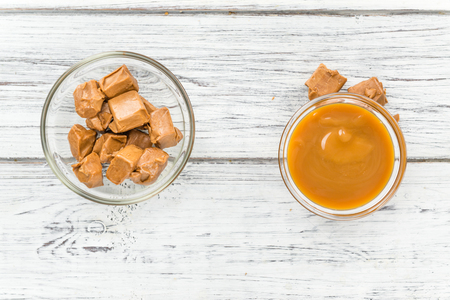 Caramel Sauce on a vintage background as detailed close-up shot (selective focus)の写真素材