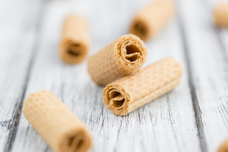 Sweet Wafers as high detailed close-up shot on a vintage wooden table; selective focusの写真素材