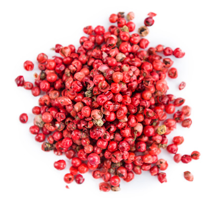 Fresh Pink Peppercorns isolated on white background; close-up shotの写真素材