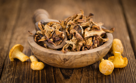 Fresh made Dried Chanterelles on a vintage background as detailed close-up shotの写真素材