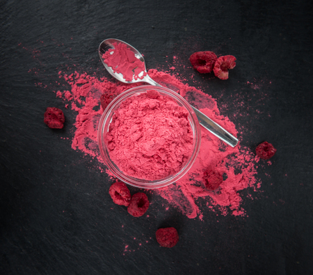 Homemade Ground Raspberries on vintage background selective focus; close-up shotの写真素材