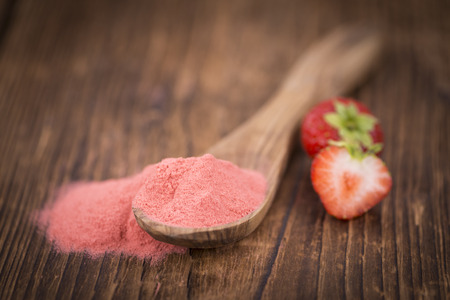 Fresh made Strawberry powder on a vintage background as detailed close-up shotの写真素材