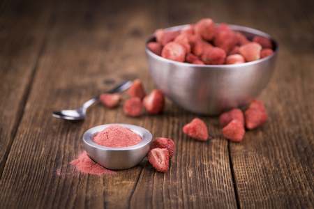 Fresh made Strawberry powder on a vintage background as detailed close-up shotの写真素材