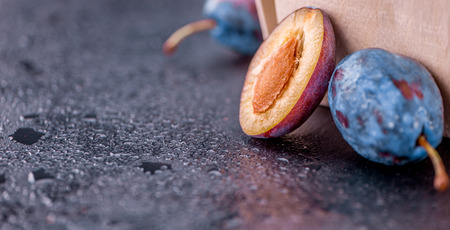 Portion of fresh Plums  close-up shot; selective focusの写真素材