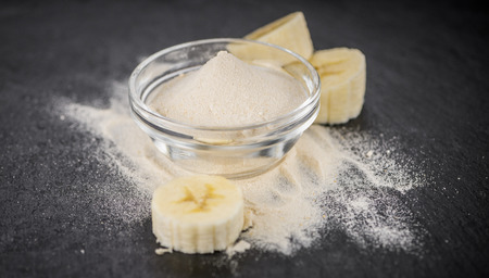 Portion of Ground Banana on a rustic slate slab, selective focus, close-up shotの写真素材