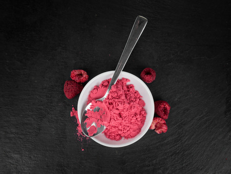 Homemade Ground Raspberries on vintage background selective focus; close-up shotの写真素材