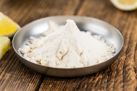 Portion of healthy Lemon powder (selective focus; close-up shot)の写真素材