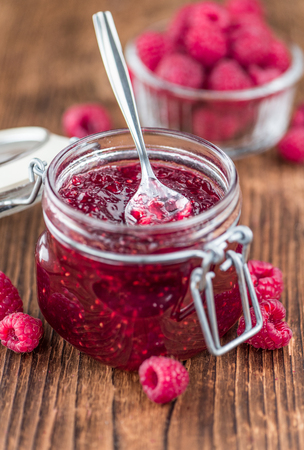 Some homemade Raspberry Jam as detailed close-up shot, selective focus