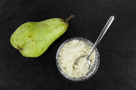 Portion of Pear powder as detailed close-up shot; selective focusの写真素材