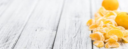 Portion of tangerines (close-up shot) on a vintage background (selective focus)の写真素材