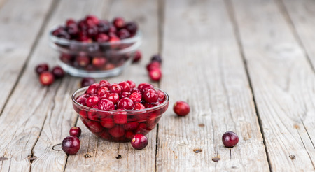 Portion of healthy Cranberries (preserved) (selective focus; close-up shot)の写真素材