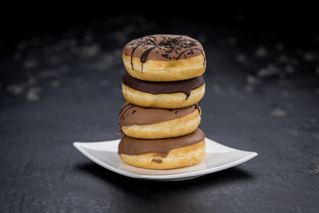 Fresh made Donuts as detailed close-up shots (selective focus)の写真素材