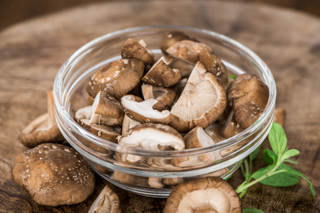 Portion of fresh Shiitake mushrooms  close-up shot; selective focusの写真素材
